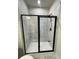 Modern bathroom featuring black-framed glass shower at 738 Crossroad Ct, Powder Springs, GA 30127