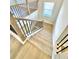 Staircase features light wood steps and dark metal railings at 738 Crossroad Ct, Powder Springs, GA 30127
