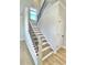 Staircase features dark metal railings and light wood steps at 738 Crossroad Ct, Powder Springs, GA 30127