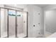 New bathroom boasts a frameless glass shower at 404 Beacon Way, Villa Rica, GA 30180