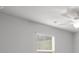 Bedroom featuring ceiling fan and window for optimal comfort and natural light at 404 Beacon Way, Villa Rica, GA 30180