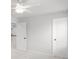 Bright bedroom featuring gray walls, plush carpet, and closet for storage at 404 Beacon Way, Villa Rica, GA 30180