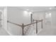 Bright hallway with white wainscoting and neutral carpet offers a clean transition between spaces at 404 Beacon Way, Villa Rica, GA 30180
