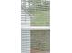 Window with blinds overlooking the backyard with a nice grassy area at 404 Beacon Way, Villa Rica, GA 30180