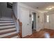 Inviting entryway with hardwood floors, staircase, and traditional moldings at 2382 Gallard St, Lawrenceville, GA 30043