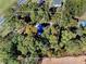 Overhead view of house nestled in a wooded lot at 3530 Dahlonega Hwy, Cumming, GA 30028