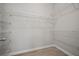 Spacious closet features wire shelving and luxury vinyl plank flooring at 6329 Edgewater Cv, Fairburn, GA 30213