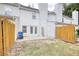 Fenced backyard with patio at 6693 Villa Ct # 6693, Lithonia, GA 30038