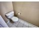 Powder room with white tile flooring and neutral paint at 6693 Villa Ct # 6693, Lithonia, GA 30038