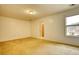Spacious bedroom with carpet, closet and window to the outside at 6693 Villa Ct # 6693, Lithonia, GA 30038