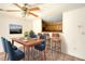 Cozy dining room with a dining table, chairs, and a view into the kitchen at 6693 Villa Ct # 6693, Lithonia, GA 30038