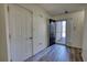 Entryway features vinyl floors, coat closet, and view to the exterior at 6693 Villa Ct # 6693, Lithonia, GA 30038