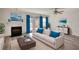 Cozy living room featuring a fireplace, modern furniture, and hardwood floors at 6693 Villa Ct # 6693, Lithonia, GA 30038