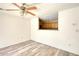 Bright living room featuring hardwood floors and a view of the kitchen area at 6693 Villa Ct # 6693, Lithonia, GA 30038