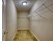 Walk-in closet with carpet flooring and wire shelving at 6693 Villa Ct # 6693, Lithonia, GA 30038