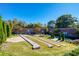 Picturesque park showcasing landscaped grounds, stone pathways, and brick walls under a clear sky at 1899 Deco Dr, Kennesaw, GA 30144