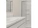 Bathroom features a modern vanity and a glass-enclosed shower at 134 Oakchase Park Ln, Hampton, GA 30228