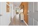 Hallway features wood floors and a console table at 134 Oakchase Park Ln, Hampton, GA 30228