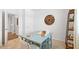 Bright office space with a large desk and rustic wooden clock at 134 Oakchase Park Ln, Hampton, GA 30228