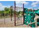 Community playground with modern equipment and safe play surfaces at 134 Oakchase Park Ln, Hampton, GA 30228