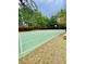 Outdoor basketball court featuring well-maintained surface with a backboard and hoop at 306 Mountain Laurel Walk, Canton, GA 30114