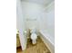 Bathroom featuring a toilet and shower with tile flooring at 306 Mountain Laurel Walk, Canton, GA 30114