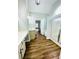 Bathroom with double vanity, tub, and walk-in shower, all featuring wood look flooring at 306 Mountain Laurel Walk, Canton, GA 30114