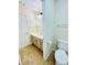 Bathroom featuring a toilet and vanity with ample cabinets at 306 Mountain Laurel Walk, Canton, GA 30114