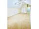 Spacious carpeted bedroom featuring a ceiling fan and closet for ample storage at 306 Mountain Laurel Walk, Canton, GA 30114