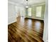 Dining room showcasing hardwood floors, natural light, and elegant architectural details at 306 Mountain Laurel Walk, Canton, GA 30114