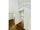 Bright foyer with hardwood floors and an open staircase leading to the second floor at 306 Mountain Laurel Walk, Canton, GA 30114