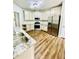 Modern kitchen featuring stainless steel appliances, granite countertops, and ample storage at 306 Mountain Laurel Walk, Canton, GA 30114