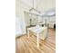 Kitchen island with granite countertop and modern pendant lighting at 306 Mountain Laurel Walk, Canton, GA 30114