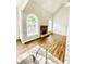 Bright living room with vaulted ceilings, stone fireplace, and hardwood floors at 306 Mountain Laurel Walk, Canton, GA 30114