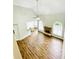 Bright, open-concept living room with hardwood floors and vaulted ceilings at 306 Mountain Laurel Walk, Canton, GA 30114