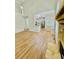 Spacious open-plan living room, with fireplace, kitchen, and hardwood floors at 306 Mountain Laurel Walk, Canton, GA 30114