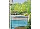 Sparkling community pool area with a black fence, offering residents a refreshing escape at 306 Mountain Laurel Walk, Canton, GA 30114