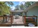 View of the spacious back deck with outdoor furniture, and a barbecue grill at 294 Puckett Se Rd, Emerson, GA 30137