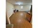 Large open basement area with wood-look flooring and access to backyard at 294 Puckett Se Rd, Emerson, GA 30137