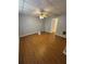 Spacious bedroom features wood laminate flooring and a ceiling fan; perfect for relaxation at 294 Puckett Se Rd, Emerson, GA 30137