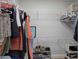 Walk-in closet with wire shelving and hanging rods, providing ample storage space at 294 Puckett Se Rd, Emerson, GA 30137