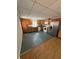 Traditional eat-in kitchen features oak cabinets, stainless steel refrigerator, and white appliances at 294 Puckett Se Rd, Emerson, GA 30137
