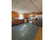 Traditional eat-in kitchen features oak cabinets, stainless steel refrigerator, and white appliances at 294 Puckett Se Rd, Emerson, GA 30137