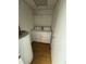 Compact laundry room with washer, dryer, and water heater, maximizing functionality at 294 Puckett Se Rd, Emerson, GA 30137