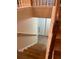 Staircase leading down to a finished basement with tile flooring at 6922 Magnolia Park Dr, Norcross, GA 30093
