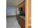 Kitchen with stainless steel appliances and wood cabinets at 6922 Magnolia Park Dr, Norcross, GA 30093
