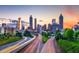 Atlanta skyline view at sunset featuring modern buildings and active roadways at 898 Oak Sw St # 3108, Atlanta, GA 30310