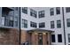 Well-maintained apartment building exterior with covered entrance and manicured landscaping at 898 Oak Sw St # 3108, Atlanta, GA 30310