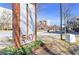 Sky Lofts signage is shown with a brick pillar and green plants at the base on a partly cloudy day at 898 Oak Sw St # 3108, Atlanta, GA 30310