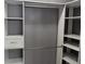 Custom walk-in closet with adjustable shelving and hanging rods for ample storage and organization at 898 Oak Sw St # 3108, Atlanta, GA 30310